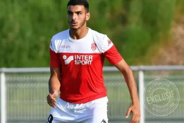 Ligue 2 powerhouses vie for talented defender Sofyane Bouzamoucha amidst FC Rouen financial crisis