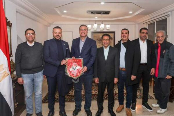 Ahly delegation responds to the invitation of Egypt's ambassador in Algeria, with El-Garhy presenting him with the Club's shield and flag