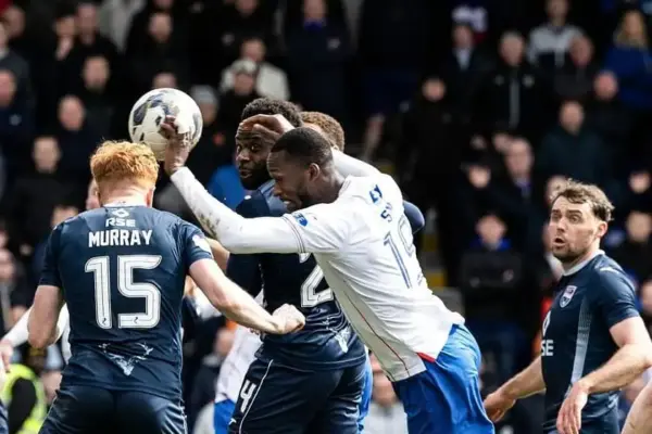 Rangers' Abdallah Sima attempts "Maradona-esque" handball goal