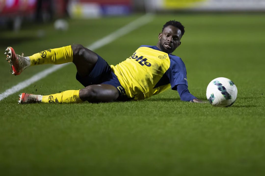 Union Saint-Gilloise's Ousseynou Niang collapses on the pitch but declared stable