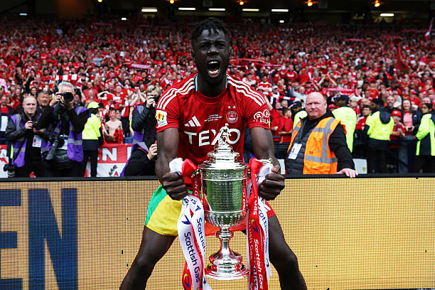 Senegalese striker Pape Habib Gueye lifts Scottish Cup as Aberdeen stun Celtic in dramatic final