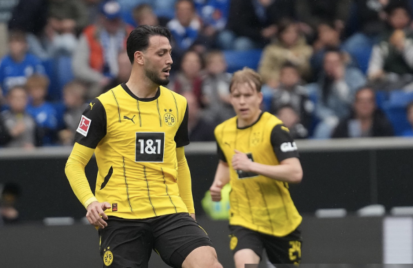 Algerian defender Bensebaini sets up key goal as Dortmund cruise past Wolfsburg to strengthen Champions League bid