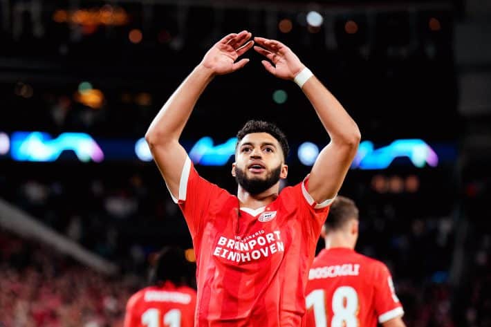 Moroccan Ismael Saibari receives guidance from PSV coach after first goal of the season