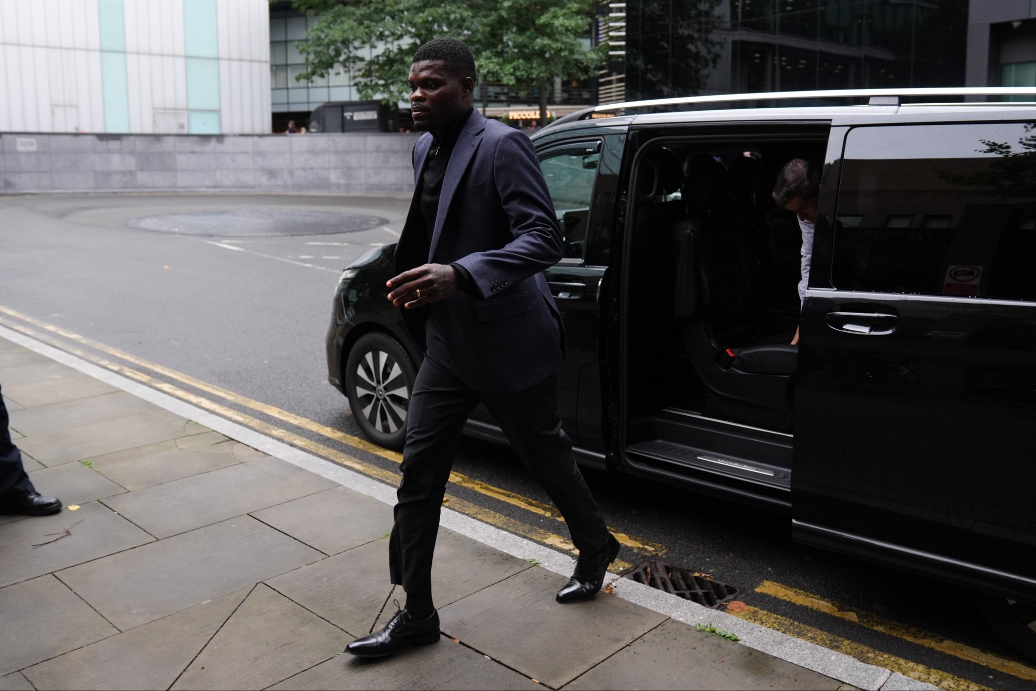 Ghana midfielder Thomas Partey denies rape charges in court, with trial scheduled to begin in November 2026