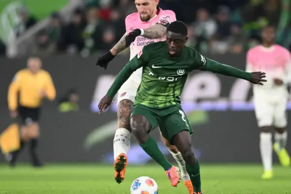 Wolfsburg trigger buy clause to permanently sign French-Congolese defender Sael Kumbedi