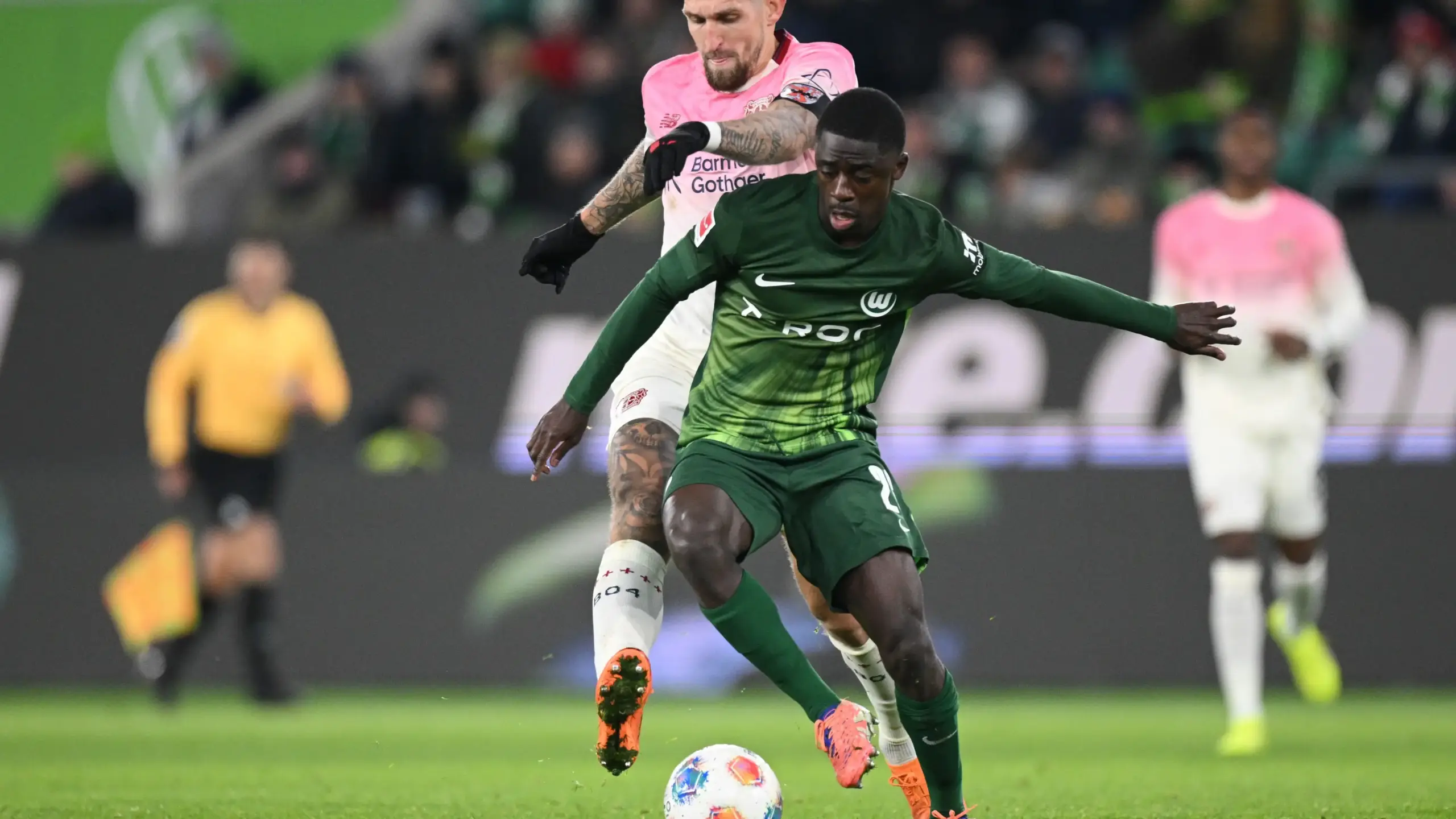 Wolfsburg trigger buy clause to permanently sign French-Congolese defender Sael Kumbedi