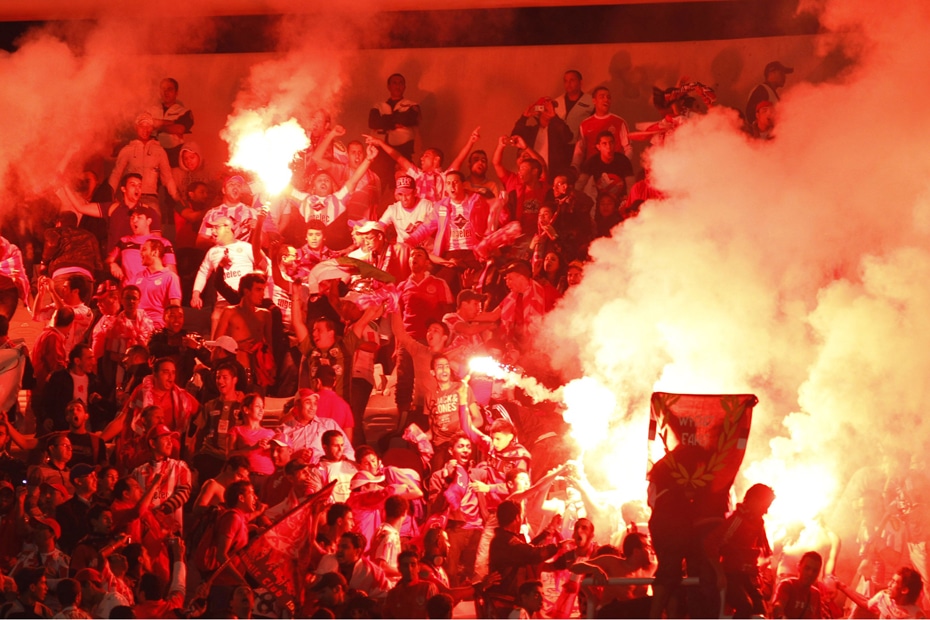  Fans of Moroccos Wydad Casablanca light flares as they watch their teams African Champions League final soccer match against Tunisias Esperance Sportive de Tunis in Tunis   CAF Champions League Espérance de Tunis vs Mazembe in front of 30000 spectators   AfricaSoccercom