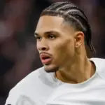 German-Nigerian defender Nnamdi Collins insists he is happy at Frankfurt amid transfer speculations