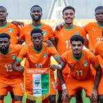 Ivory Coast and South Korea players competing during an international football match