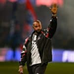Youssou N'Dour performing ahead of a football match at Stade de France