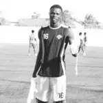 Emergency responders at the scene of a crashed vehicle involving a Senegalese football team