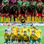 Players of Australia and Cameroon before kickoff at Accor Stadium