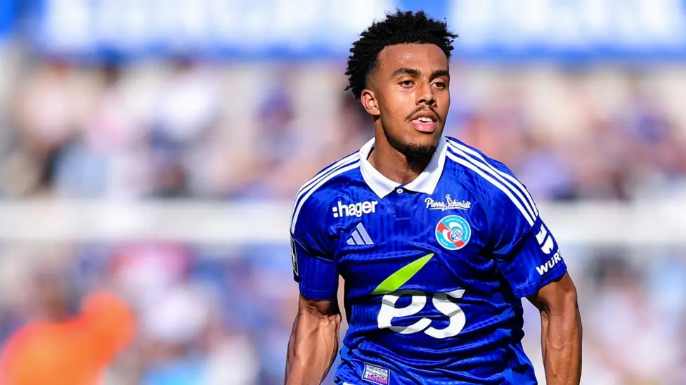 Guéla Doué playing for RC Strasbourg in Ligue 1 match