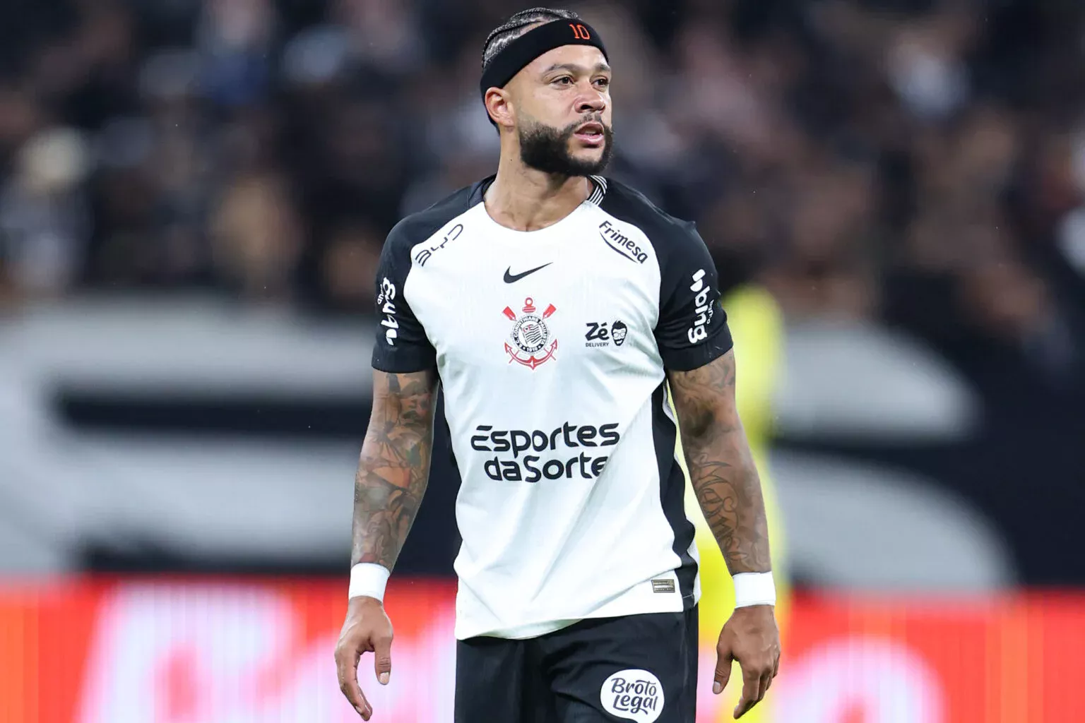 Memphis Depay looks on during a Netherlands match as concerns grow over his fitness