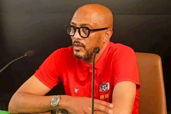 Coach Amir Abdou at a press conference