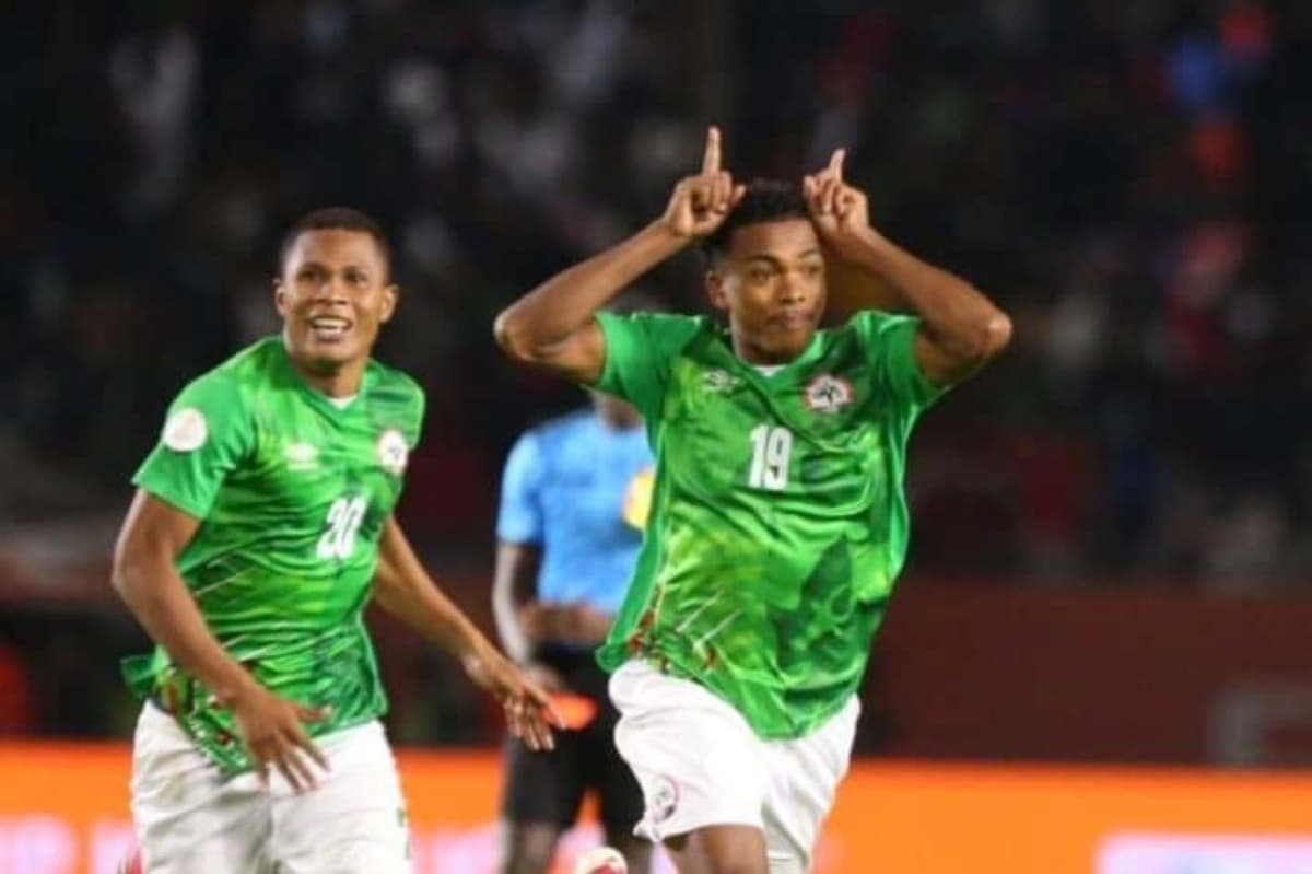 Madagascar players celebrating a goal against Kyrgyzstan