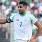 Riyad Mahrez celebrating a goal for Algeria during an international match