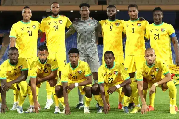 Togo and Niger players competing for the ball during an international friendly