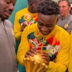 Senegal players presenting the AFCON trophy at Stade de France