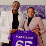 Melissa Onana alongside her brother Amadou Onana during a football event