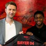 Jeremiah Mensah signing contract at Bayer Leverkusen