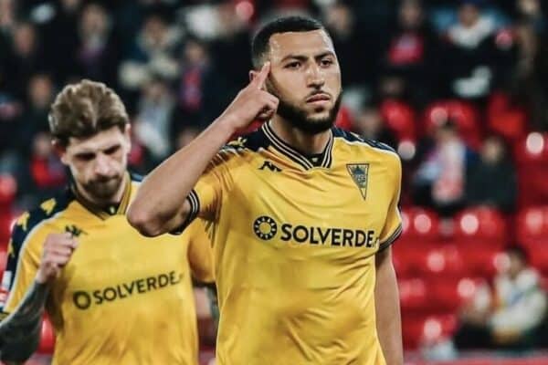 Yanis Begraoui scores in front of Morocco coach