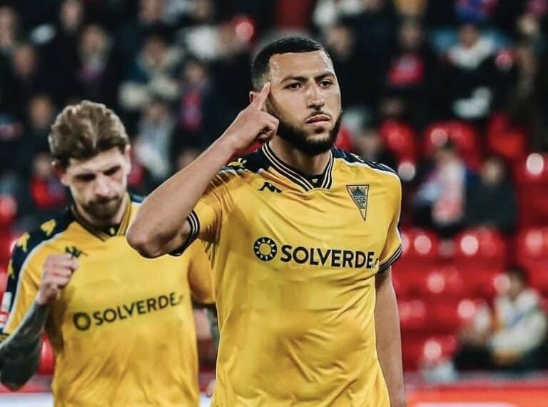 Yanis Begraoui scores in front of Morocco coach