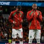 Issa Diop in Morocco national team kit during his first international appearance, showing emotion after debut match