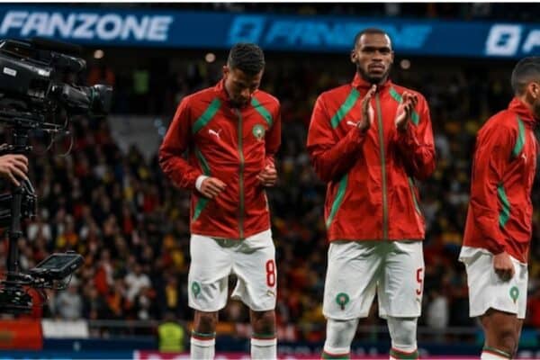 Issa Diop in Morocco national team kit during his first international appearance, showing emotion after debut match