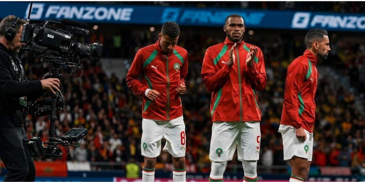 Issa Diop in Morocco national team kit during his first international appearance, showing emotion after debut match