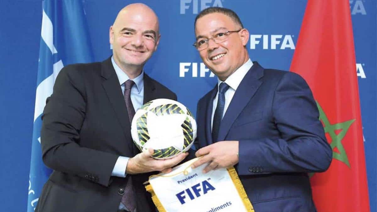 Fouzi Lekjaa speaking at a press conference