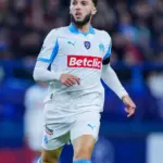Amine Gouiri leaving the pitch injured during Lorient match
