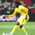 Caleb Yirenkyi playing in midfield during a match