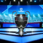 UEFA Champions League trophy displayed inside a football stadium