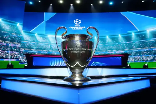 UEFA Champions League trophy displayed inside a football stadium