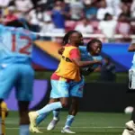 DR Congo players celebrating World Cup qualification with fans