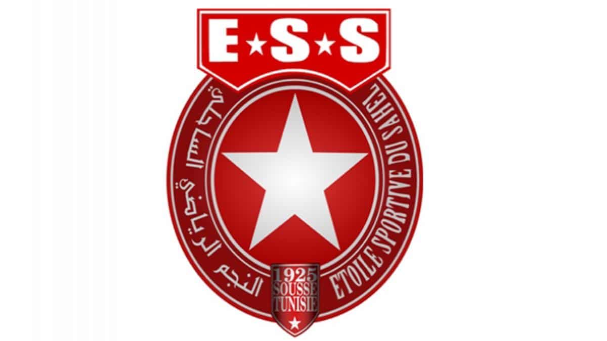 Club officials in a meeting room discussion