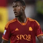 Evan Ndicka defending for Roma during a Serie A match