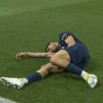 Achraf Hakimi receives treatment during Bayern Munich match