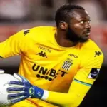Hervé Koffi making a diving save during a match