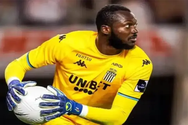 Hervé Koffi making a diving save during a match