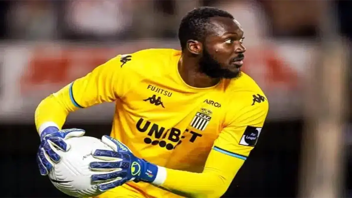 Hervé Koffi making a diving save during a match