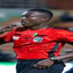 Ivorian football referee officiating a match