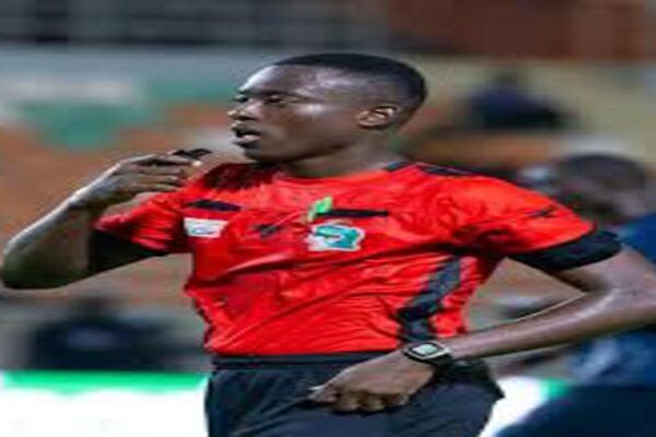 Ivorian football referee officiating a match