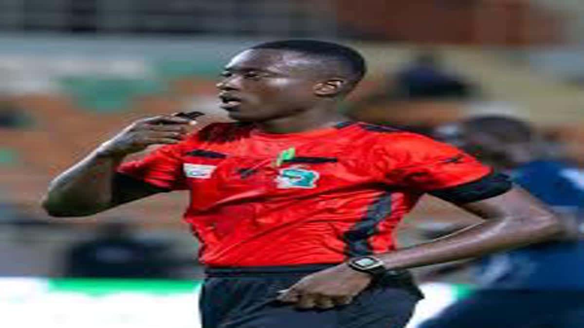 Ivorian football referee officiating a match