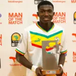 Lamine Camara playing for Senegal in an international match