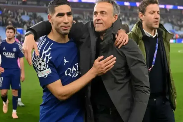 Achraf Hakimi and Luis Enrique after a match