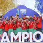 Youth football team celebrating victory