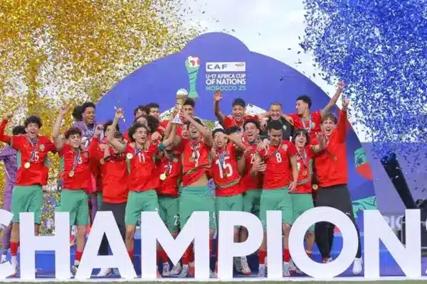 Youth football team celebrating victory