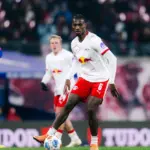 Ezechiel Banzuzi playing for RB Leipzig in midfield